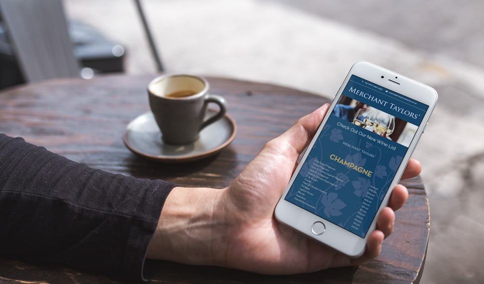 merchant taylors website on mobile phone