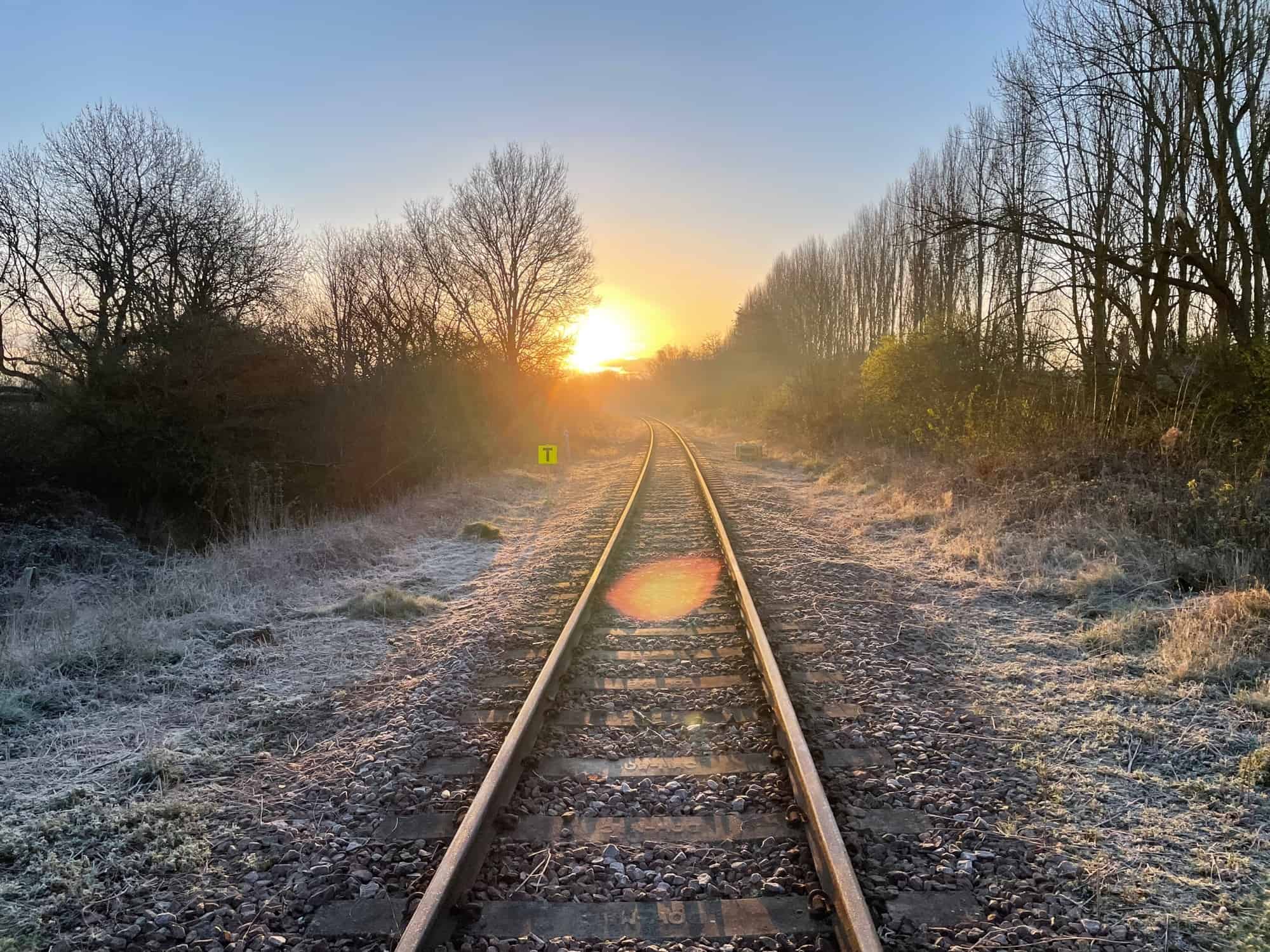 peterborough marketing tactics railway line heading into sunset Blue Dolphin