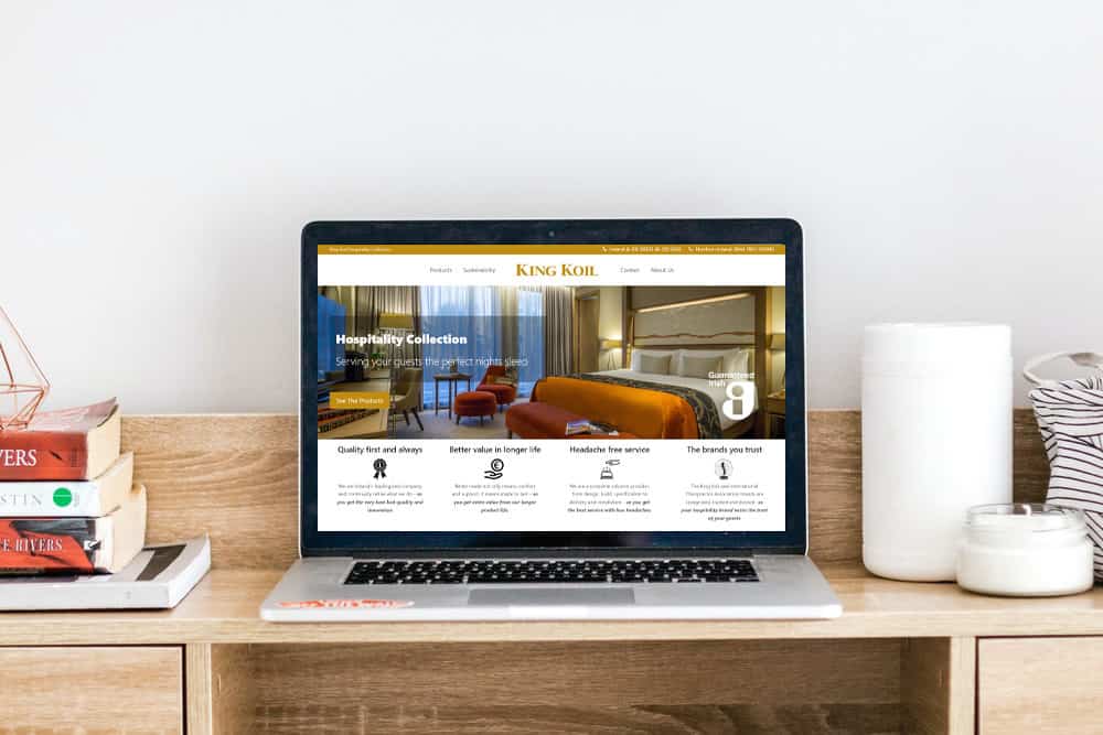 What To Consider When Developing A Website kingkoil-hotel website on laptop web design blue dolphin 2